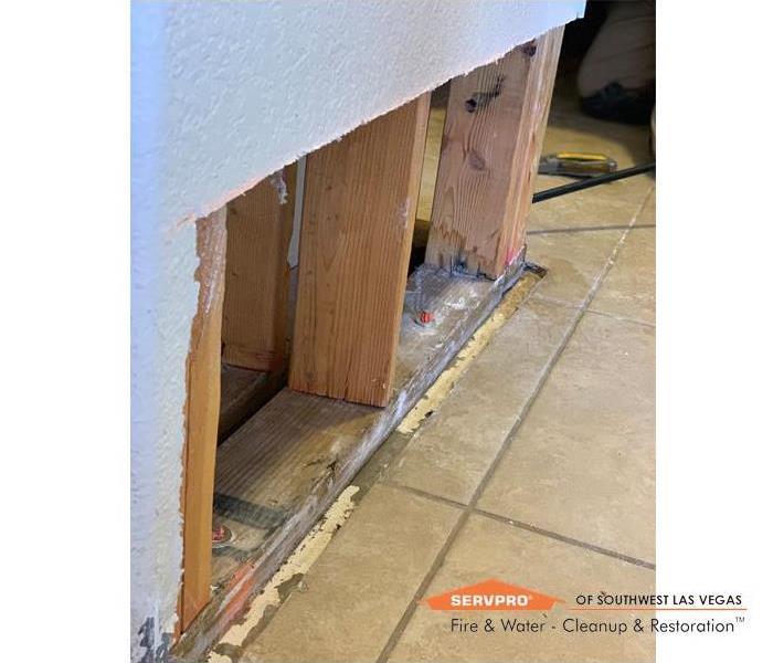 Drywall water damage restoration from a burst water pipe within a wall.