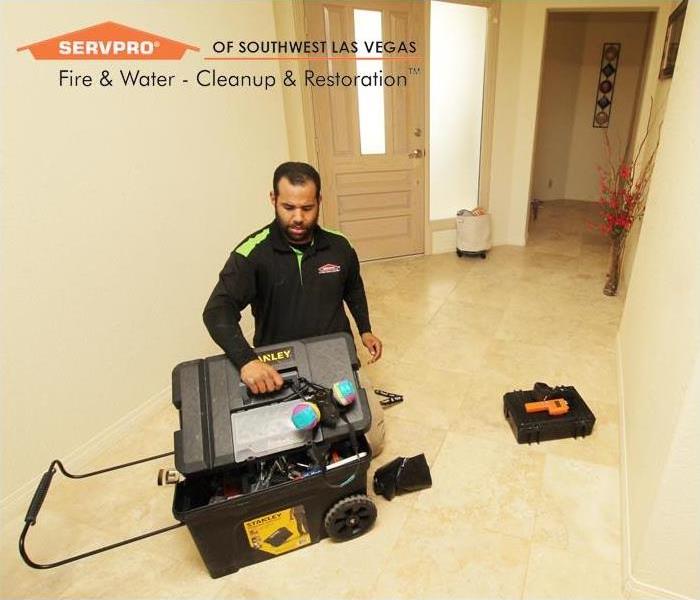 Restoration Technician cleaning up a flood in Las Vegas.